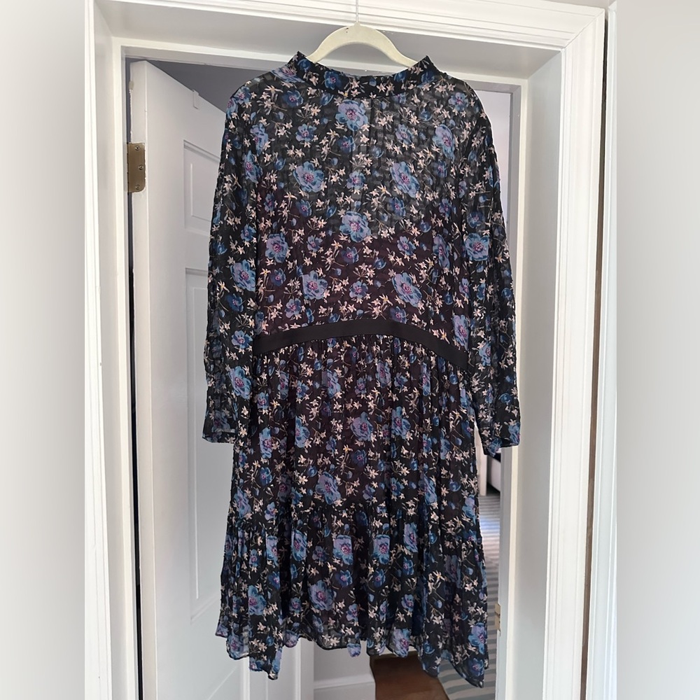 Long sleeve floral mini dress with sheer pattern over dusty rose liner.